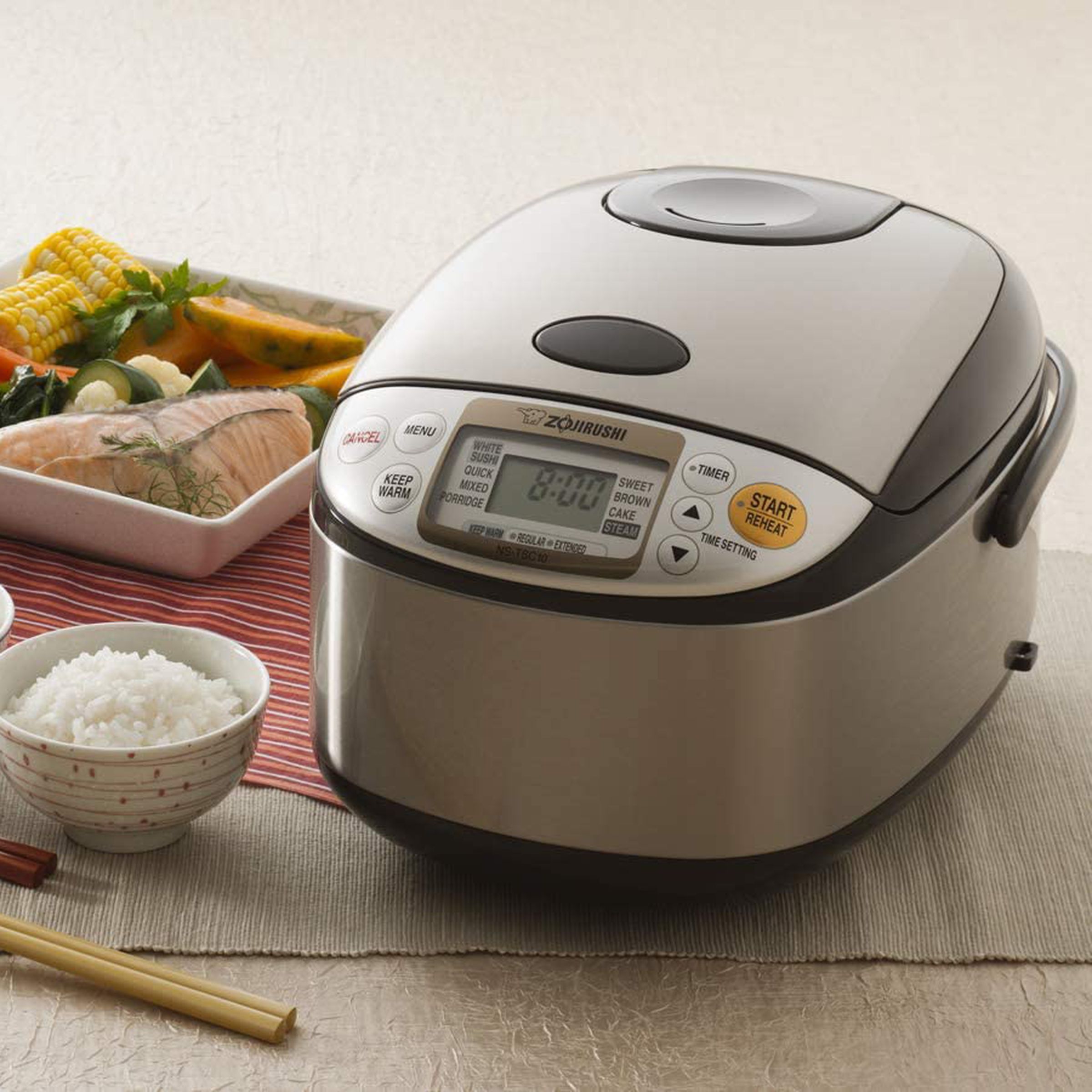 rice cooker with bowls of rice