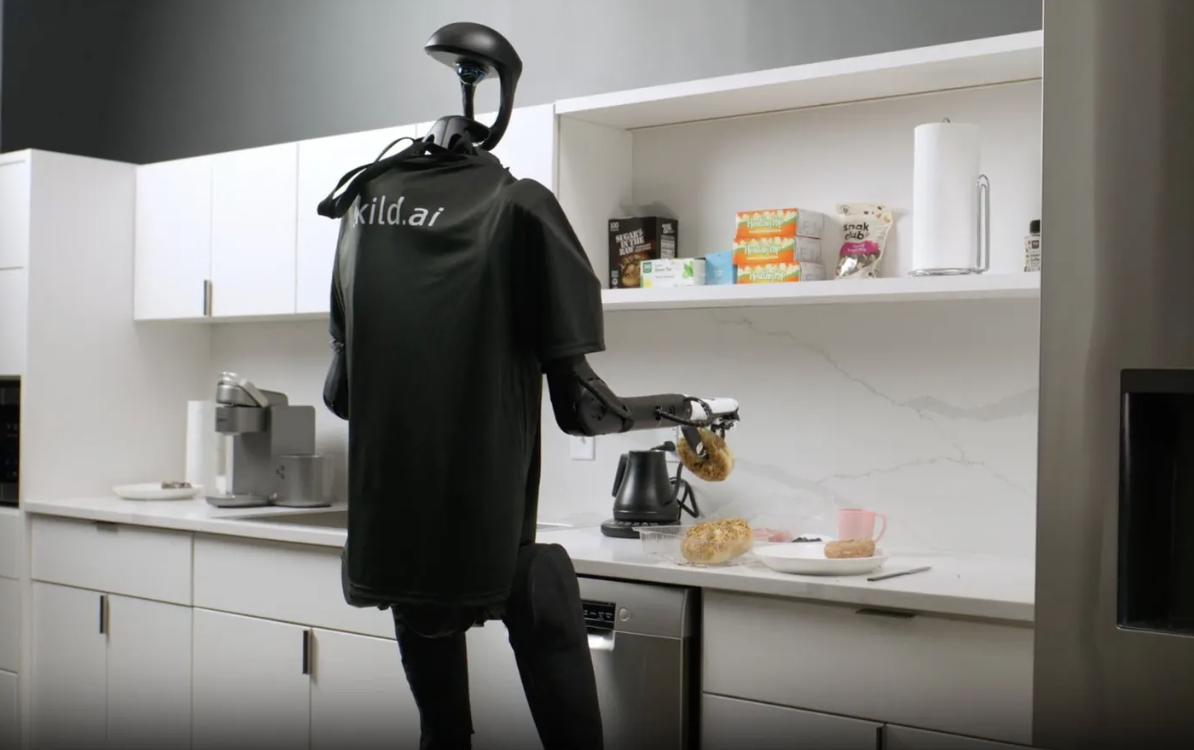 Robot hình người gắn bộ não do Skild AI phát triển tự pha cà phê và dọn bánh. Ảnh: Skild AI