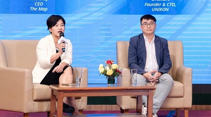 Bà Đỗ Thùy Dương - CEO The Map (trái) và ông Đinh Trần Tuấn Linh - nhà sáng lập Unikon (phải) tại sự kiện. Ảnh: MSD